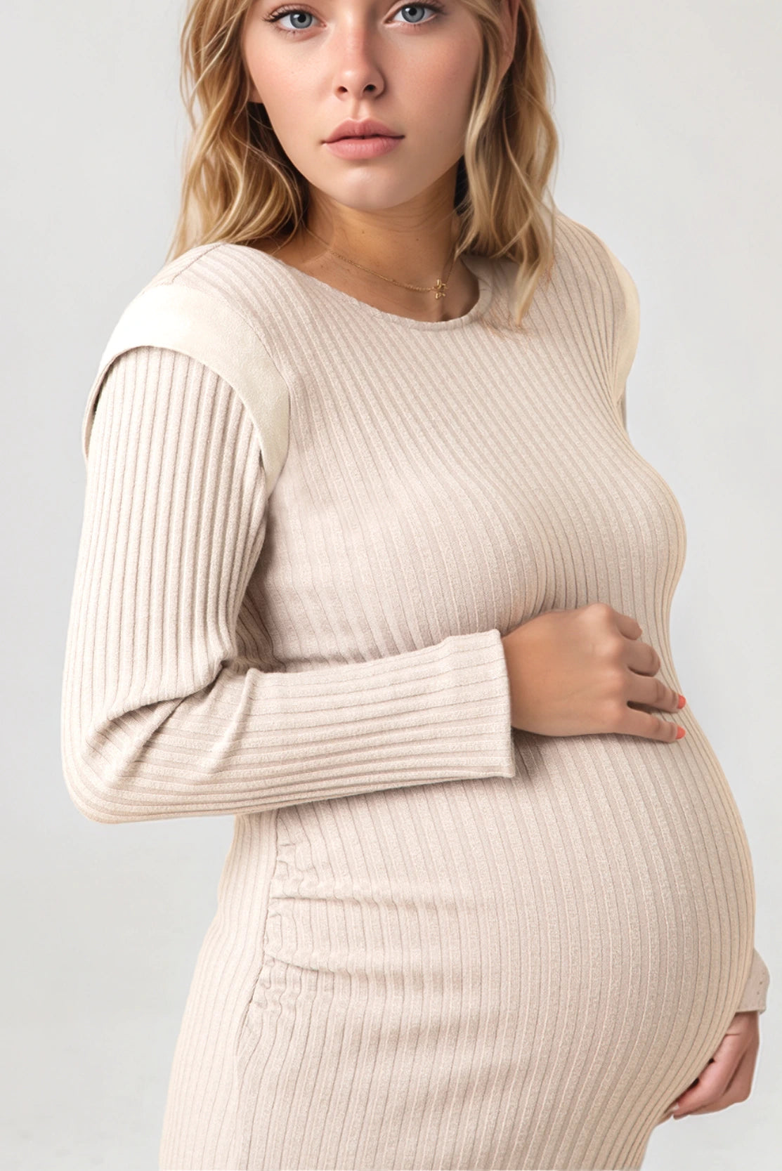 Stylish pregnant woman in beige maternity dress with side ruching for shape- CARI's elevated designer dresses for pregnancy