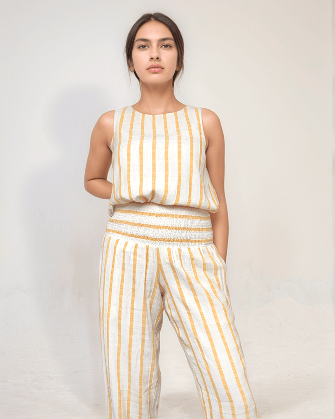 Stylish contemporary design summer trousers with shirred elastic waist comfortable for postpartum c-section or new mother, part of a matching co ord set, linen mix natural fabrics for staying cool for pregnancy and postpartum in summer, smart casual, designer maternity brand for UK, Ireland
