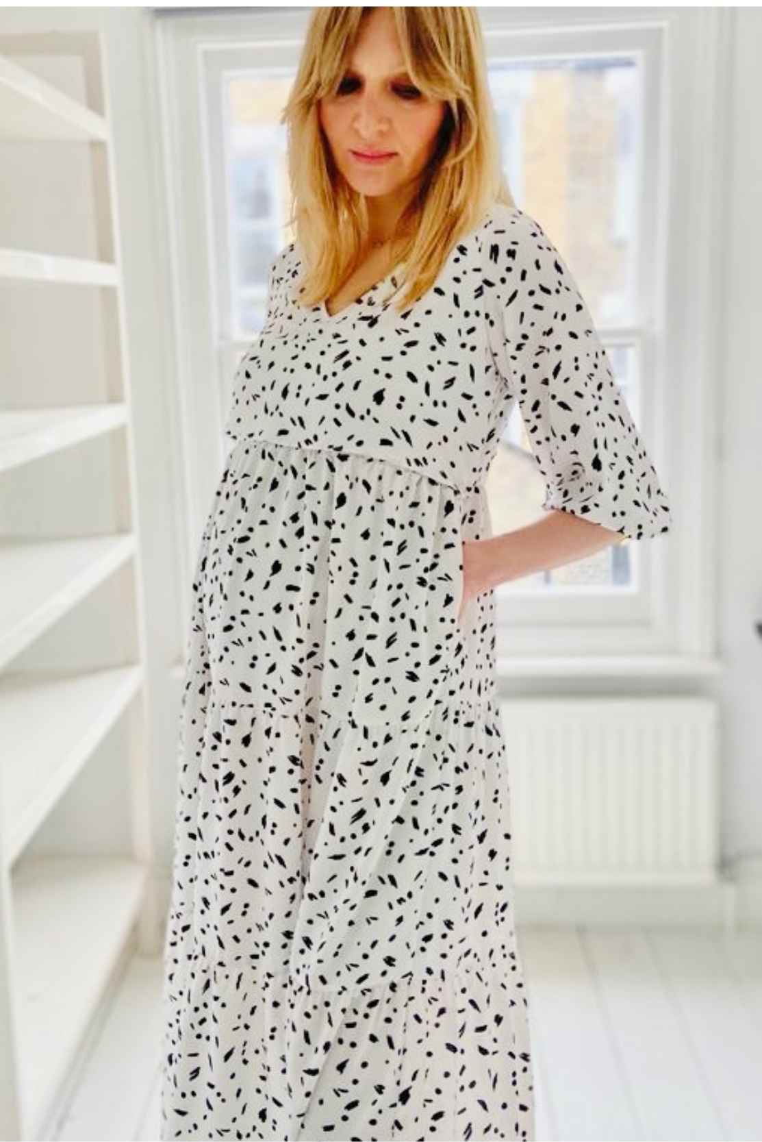 This bump- and breastfeeding-friendly dress has a boho fit, with billowy sleeves and a flattering V-neckline. For pregnancy, the tiered design makes this a stylish maternity dress choice that is also so comfortable until full-term. Postpartum, the concealed zippers allow for convenient nursing.